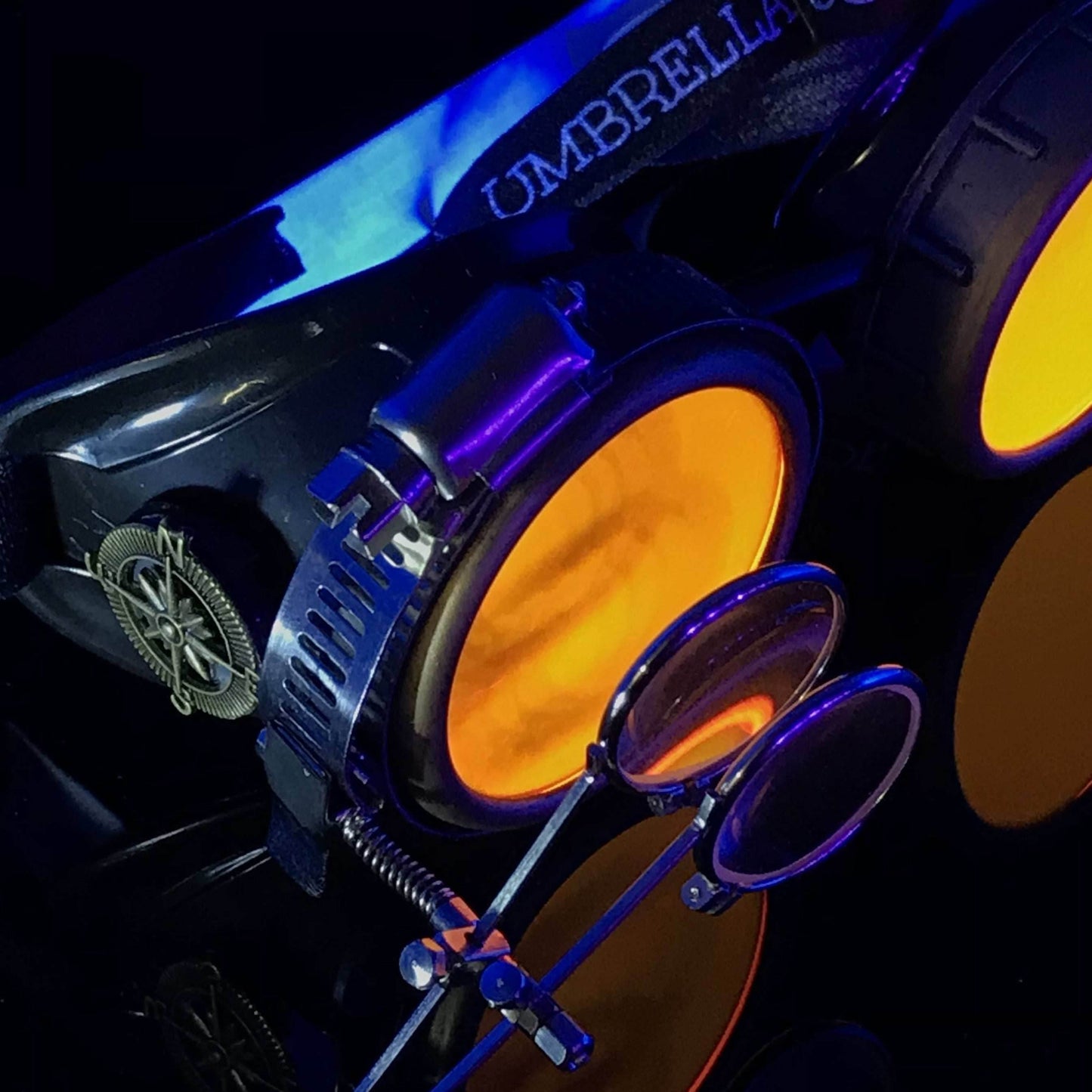 Steampunk Goggles with magnifying loupes UV glow neon orange lenses -