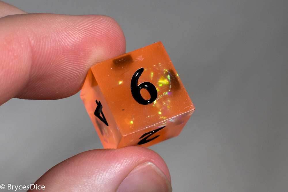 Orangetober Sharp Edge Resin 7-Dice Dice (Orange w/ Black Numbers) -