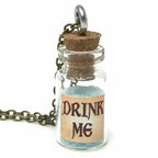 Alice in Wonderland necklace aqua glow
