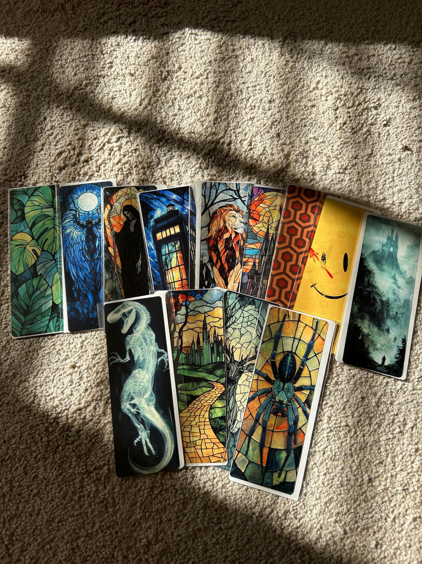 Gothic raven bookmark with stained glass arch, sunset skies and vintage pedestal, dark fantasy bird art for moody readers