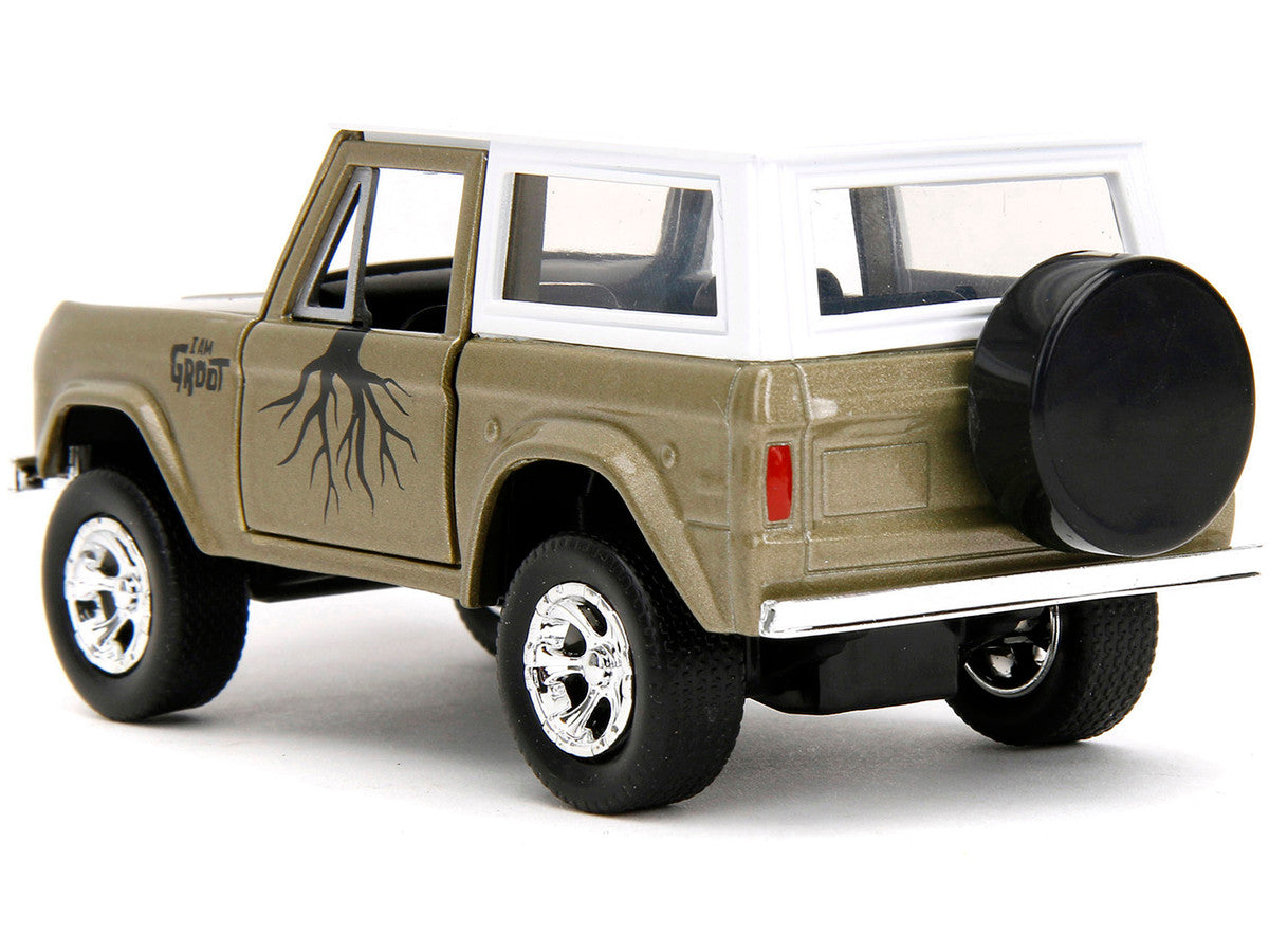 1973 Ford Bronco Gold Metallic with White Top and Groot Diecast Figure "Guardians of the Galaxy" "Marvel" Series 1/32 Diecast Model Car by Jada