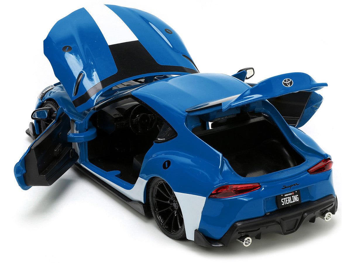 2020 Toyota Supra Blue with Graphics and Max Sterling Diecast Figurine "Robotech" "Hollywood Rides" Series 1/24 Diecast Model Car by Jada