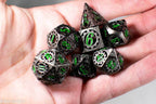 Gun Metal Hollow Gear Dice with Green Numbers 7-Dice Set - 