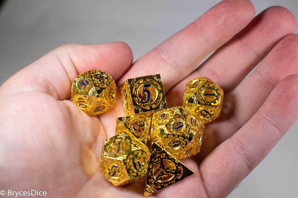 Gold Metal Hollow Gear Dice with Blue Numbers 7-Dice Set - 