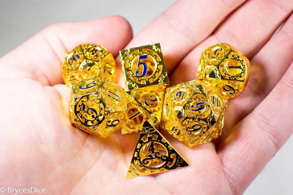 Gold Metal Hollow Gear Dice with Blue Numbers 7-Dice Set - 