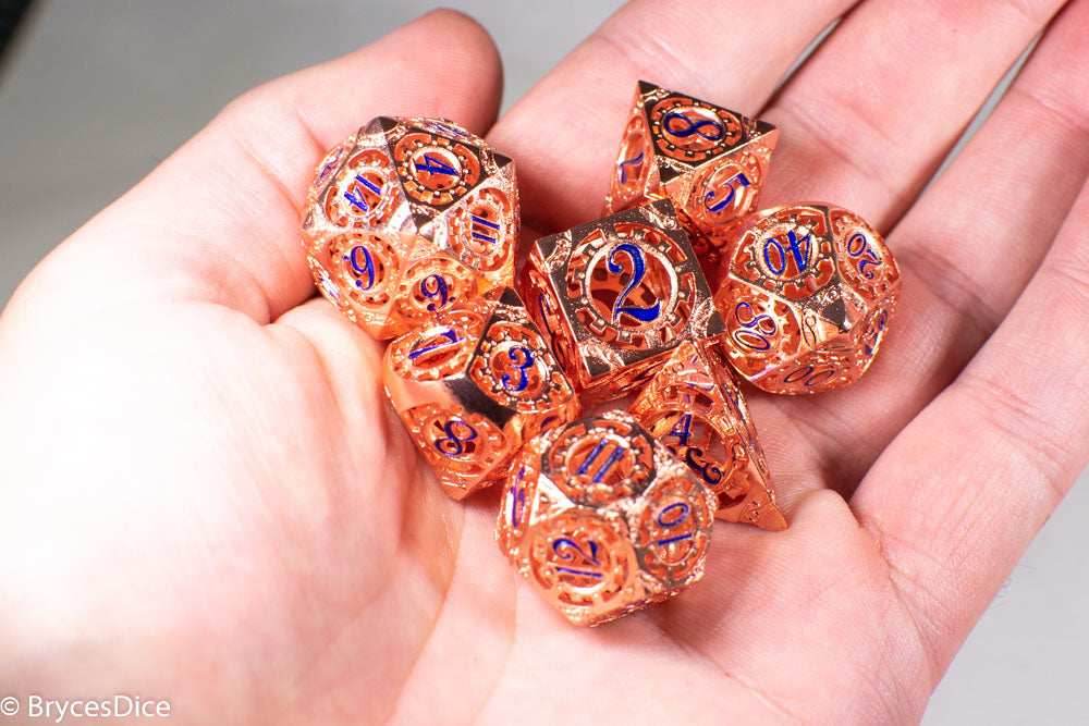 Rose Gold Metal Hollow Gear Dice with Blue Numbers 7-Dice Set - 