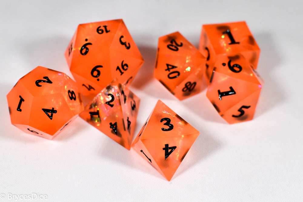 Orangetober Sharp Edge Resin 7-Dice Dice (Orange w/ Black Numbers) - 
