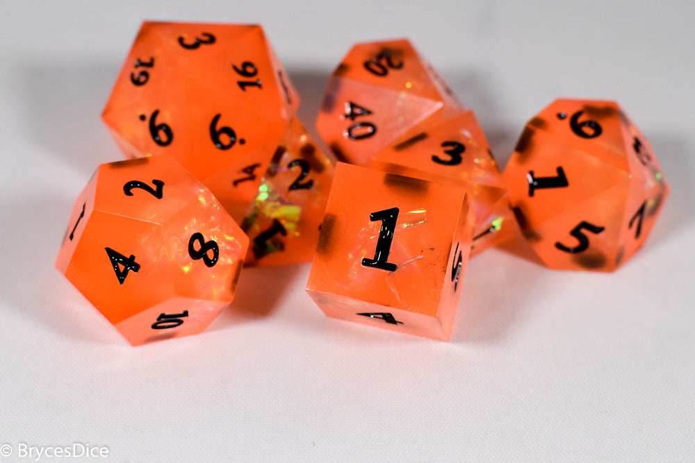 Orangetober Sharp Edge Resin 7-Dice Dice (Orange w/ Black Numbers) - 