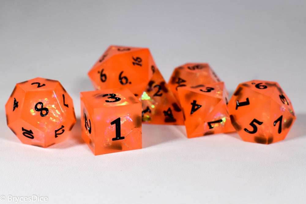 Orangetober Sharp Edge Resin 7-Dice Dice (Orange w/ Black Numbers) - 
