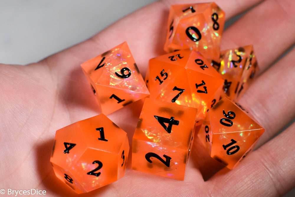 Orangetober Sharp Edge Resin 7-Dice Dice (Orange w/ Black Numbers) - 