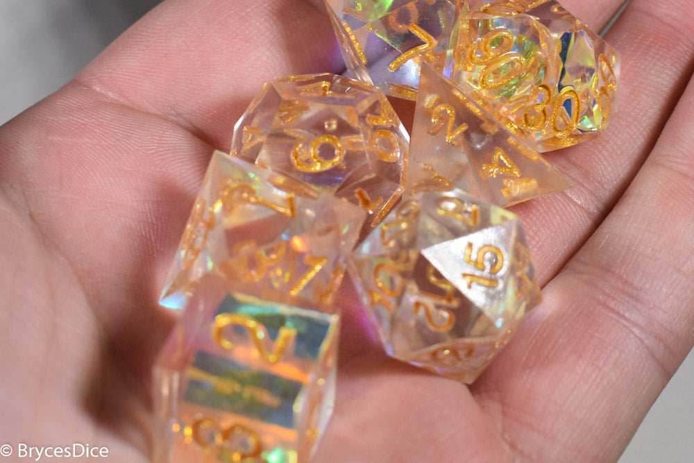 Pirates Crystal Sharp Edge Resin 7-Dice Set | Gold or Silver Ink (Clear) - Gold