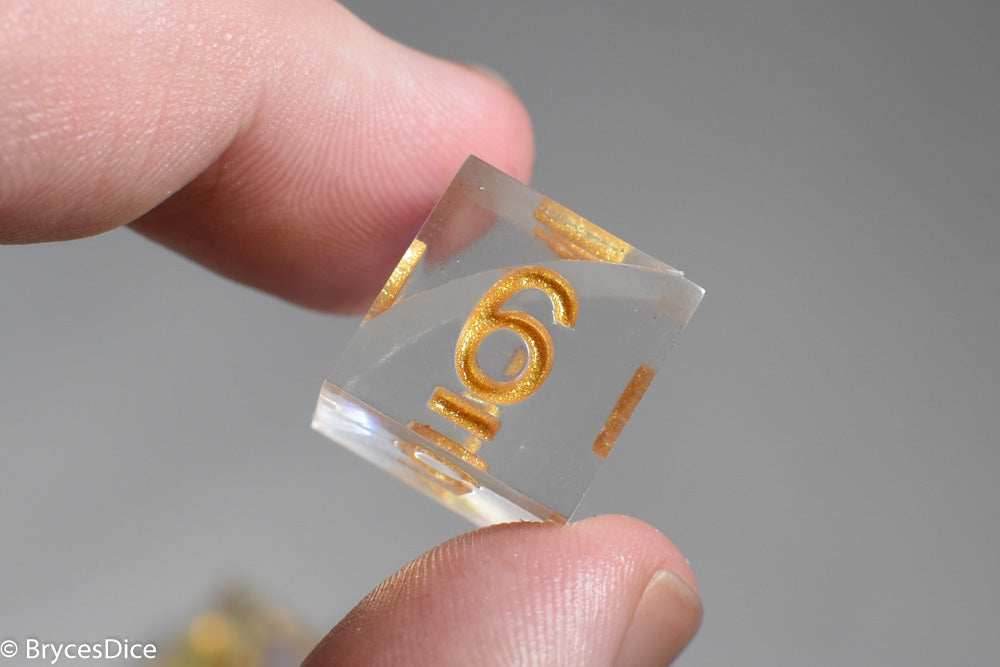 Pirates Crystal Sharp Edge Resin 7-Dice Set | Gold or Silver Ink (Clear) - Gold