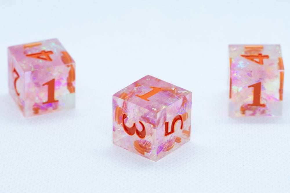 Nectar Sharp Edge Resin d6-Dice (Clear Shimmer w/ Orange Numbers) [subtle imperfection] - 