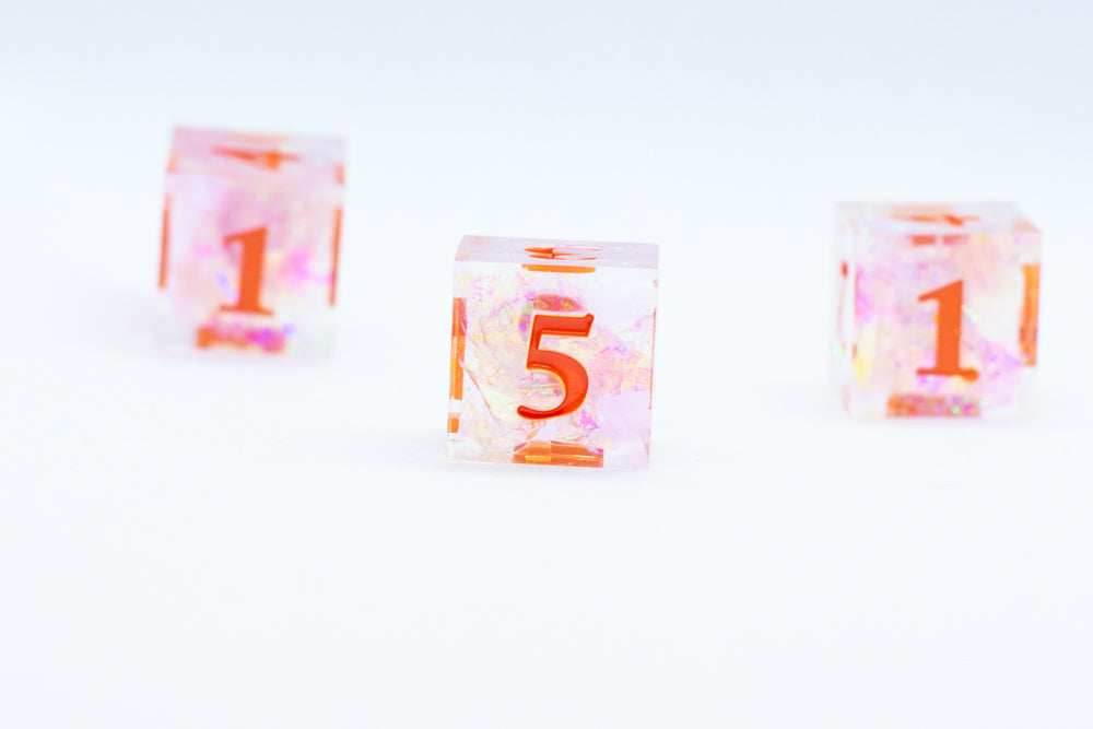 Nectar Sharp Edge Resin d6-Dice (Clear Shimmer w/ Orange Numbers) [subtle imperfection] - 