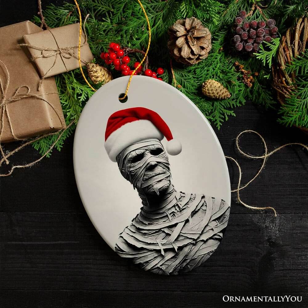 Ghoulish Mummy with Santa Hat Ornament, Sinister Holiday Keepsake for Halloween Lovers - Oval