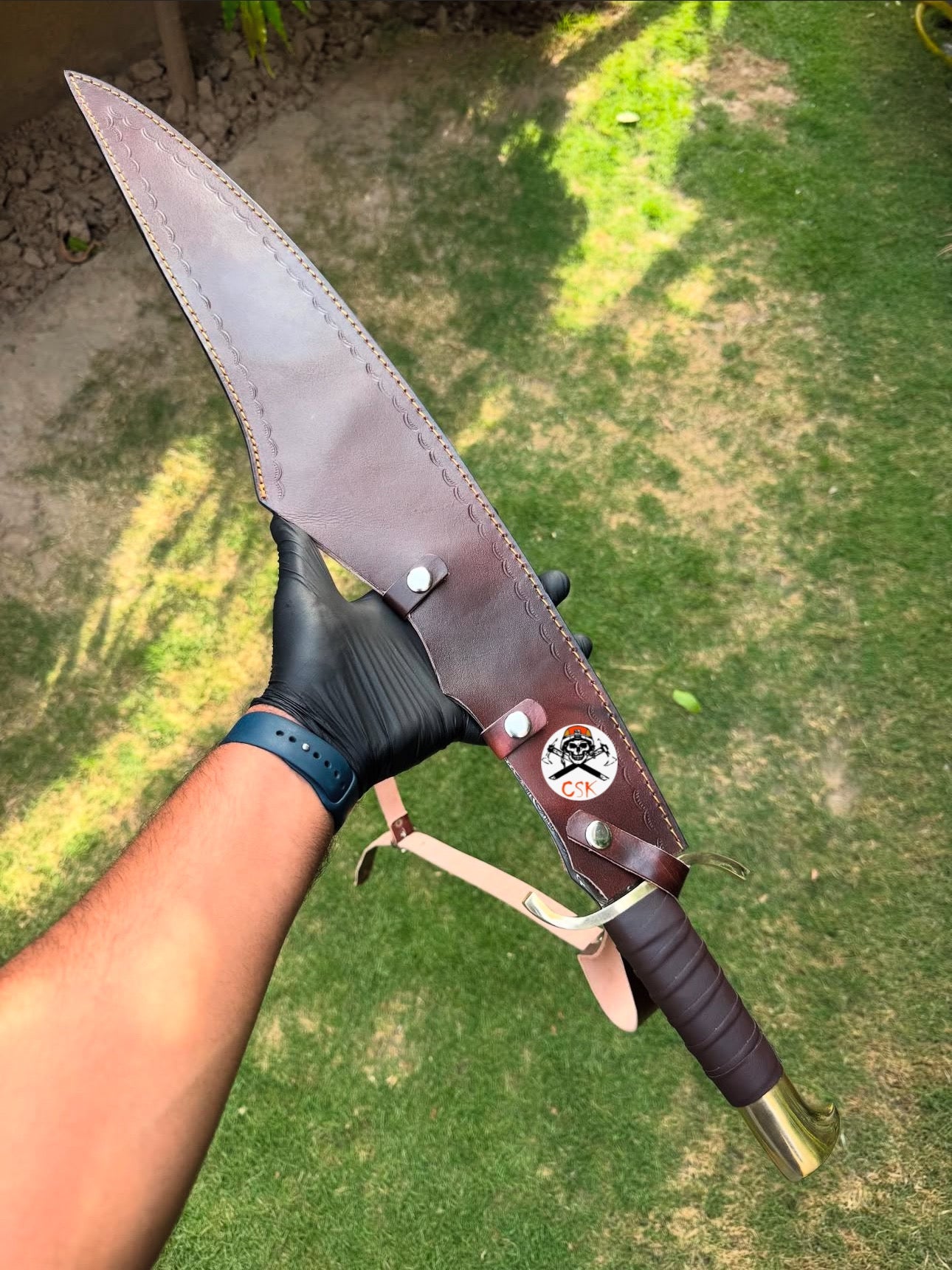 Spartan style sword with a leather-wrapped handle,Brass guard and pommel,Ornate patterned Blade