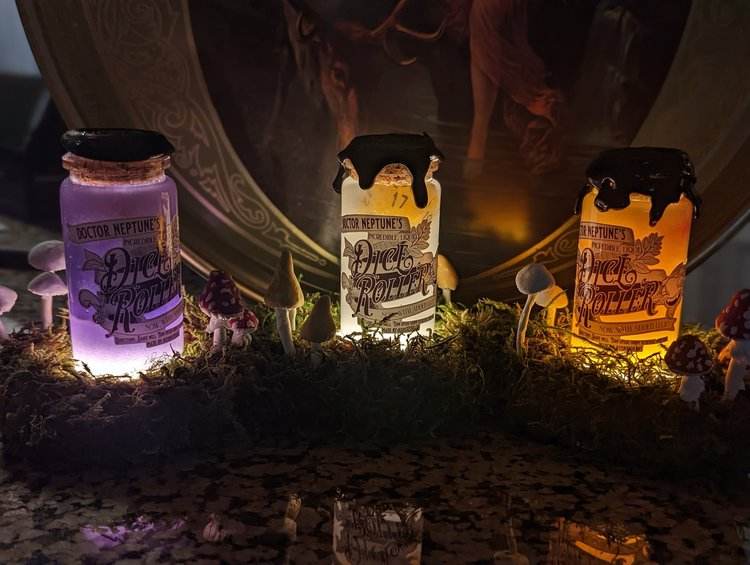 Doctor Neptune's Dice Roller - Marbled Black Die in Pink Liquid