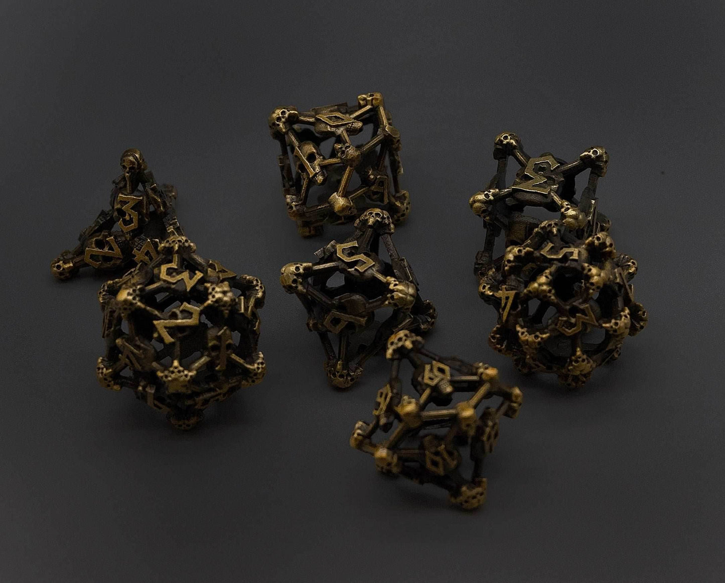 Gold Deadly Skull Dice Hollow Metal 7-Dice Set - 7-Dice Set