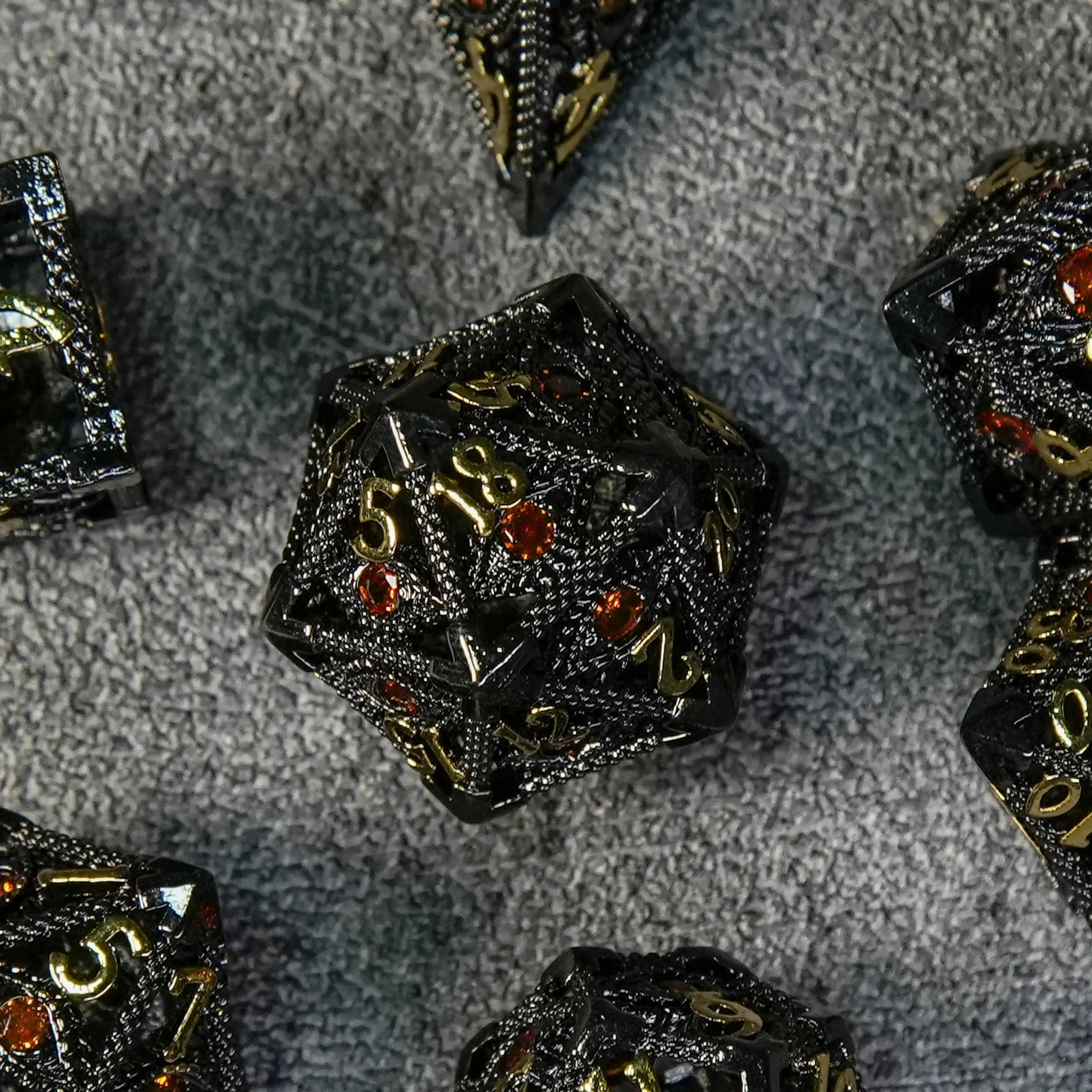 Devil's Eye Ruby Metal Hollow DND Dice Set with Gold Numbers