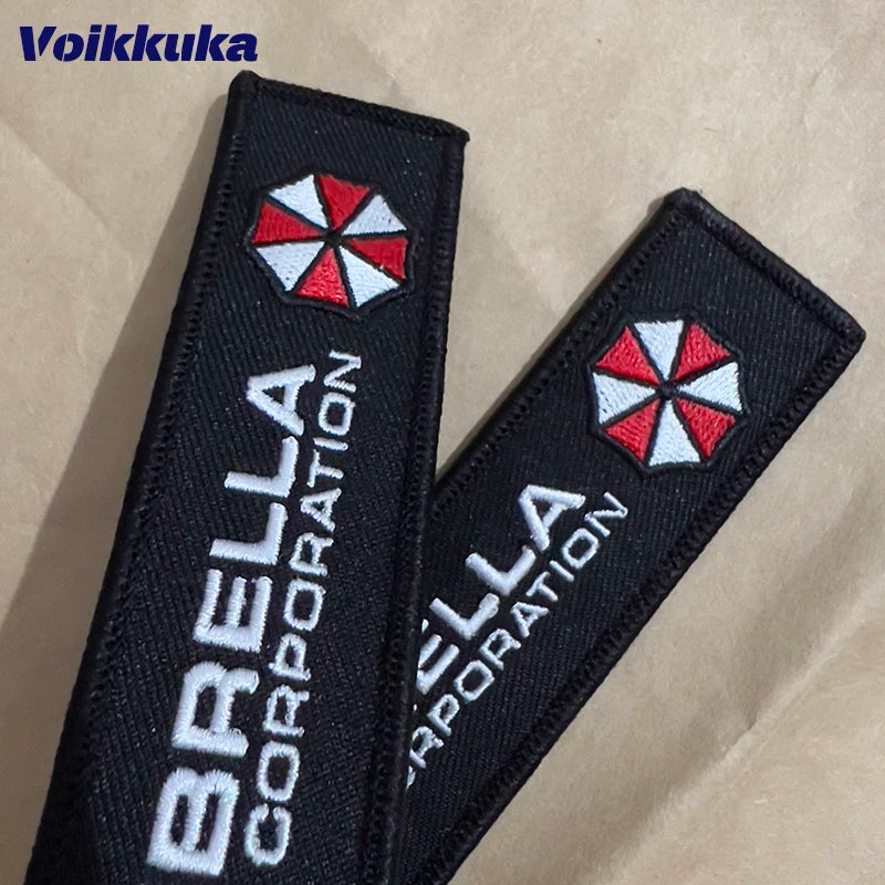 1PC 3PCS Sale Umbrella Logo 2 Styles Both Sides Embroidery Tag Key Chain Motorcycle Car Backpack Keychain Gifts Wholesale