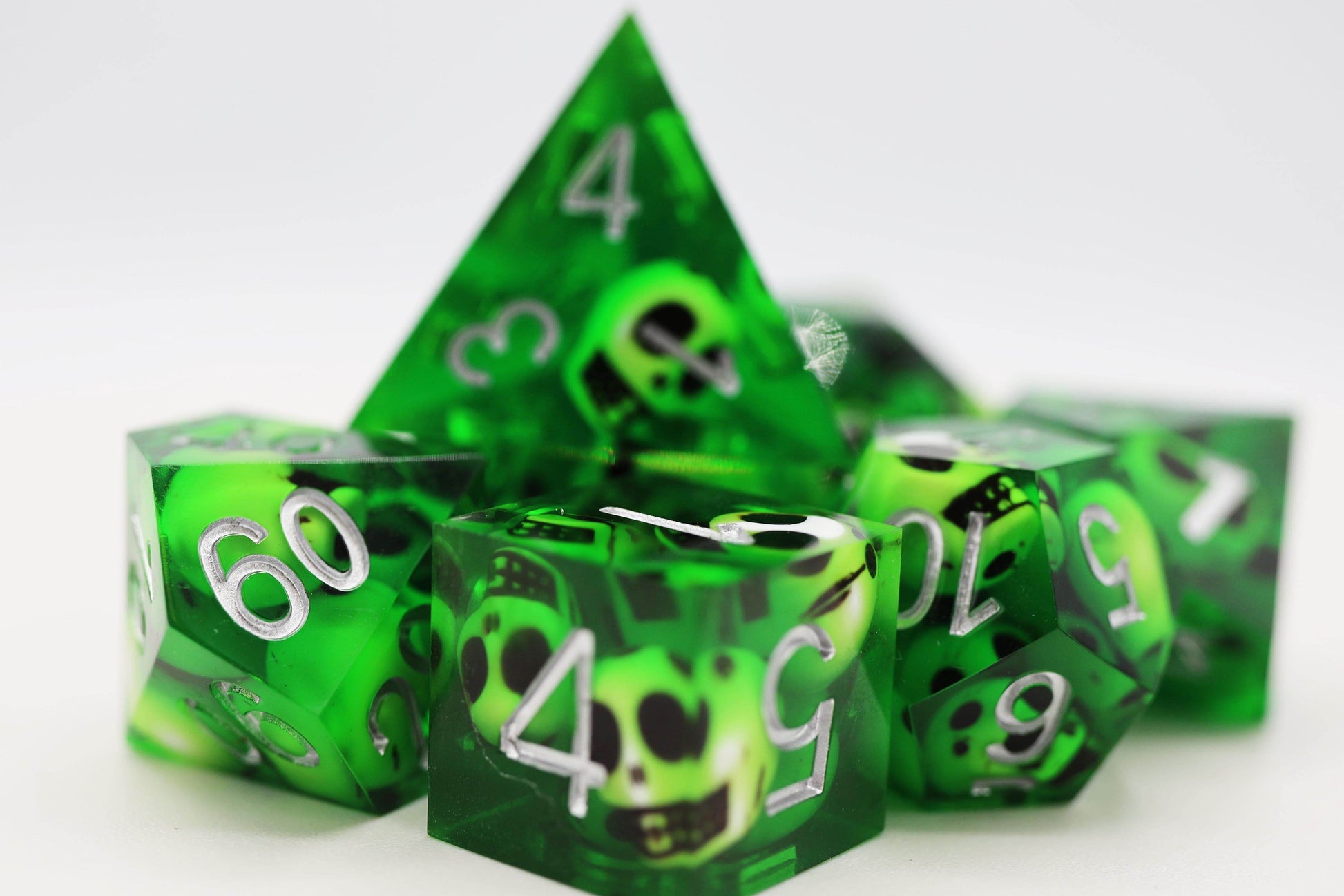 Sharp Edge Resin RPG Dice Set - Green Skulls - 