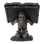 Skeleton holding Spell Book - 