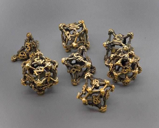 Gold Deadly Skull Dice Hollow Metal 7-Dice Set - 7-Dice Set
