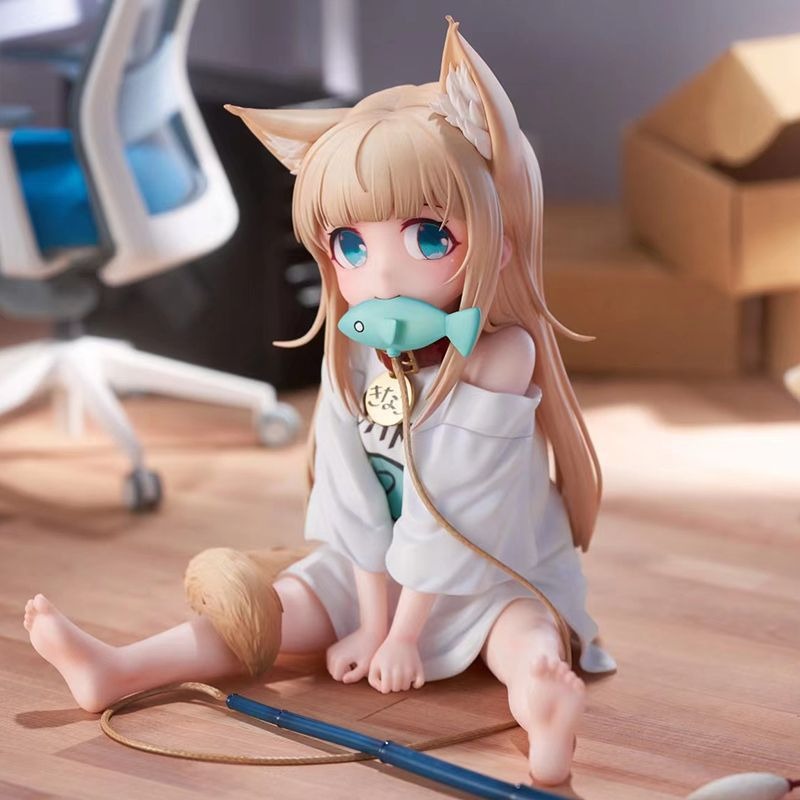 Cat girl sitting and eating fish figure