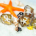 White Starfish Dice on Gold 7-Dice Set Resin Dungeons and Dragons Dice - 