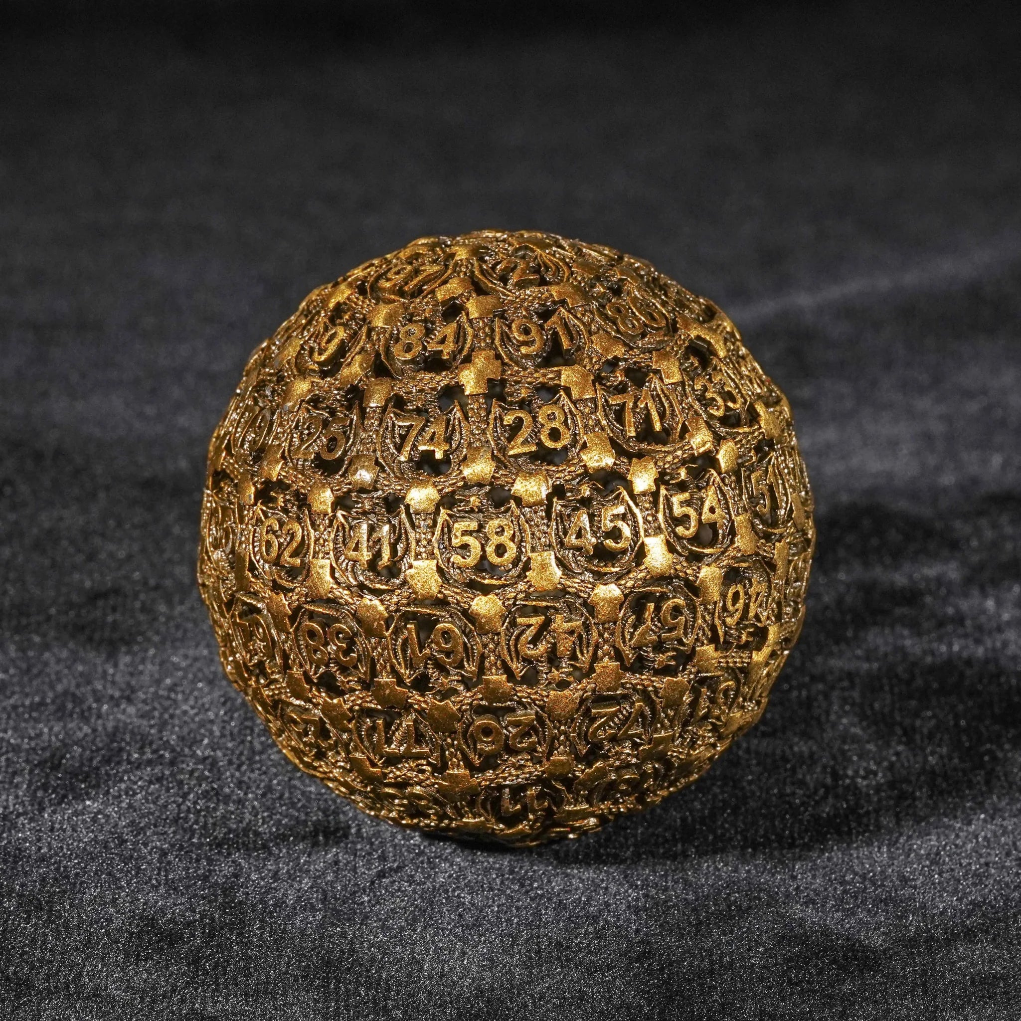 Dragon's Tooth - 50mm Antique Gold D100 Metal Dice