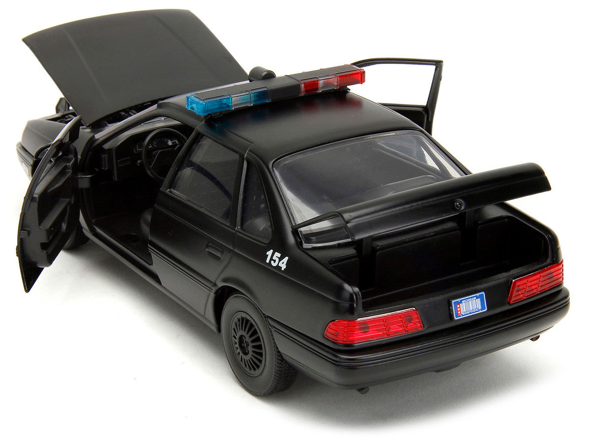 Ford Taurus OCP Matt Black "Detroit Police" and Robocop Diecast Figure 35th Anniversary "Robocop" (1987) Movie "Hollywood Rides" Series 1/24 Diecast Model Car by Jada-2