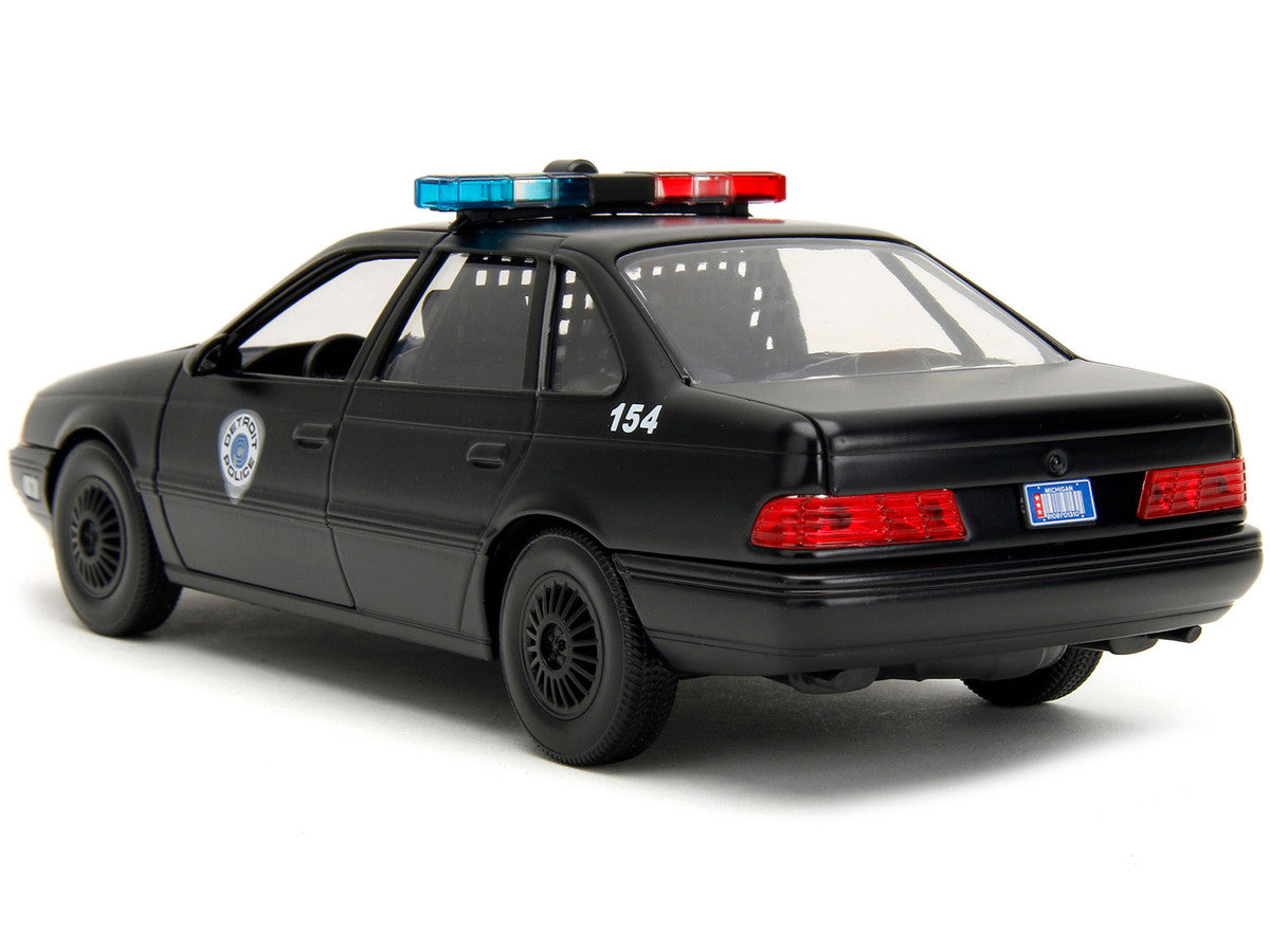 Ford Taurus OCP Matt Black "Detroit Police" and Robocop Diecast Figure 35th Anniversary "Robocop" (1987) Movie "Hollywood Rides" Series 1/24 Diecast Model Car by Jada-3