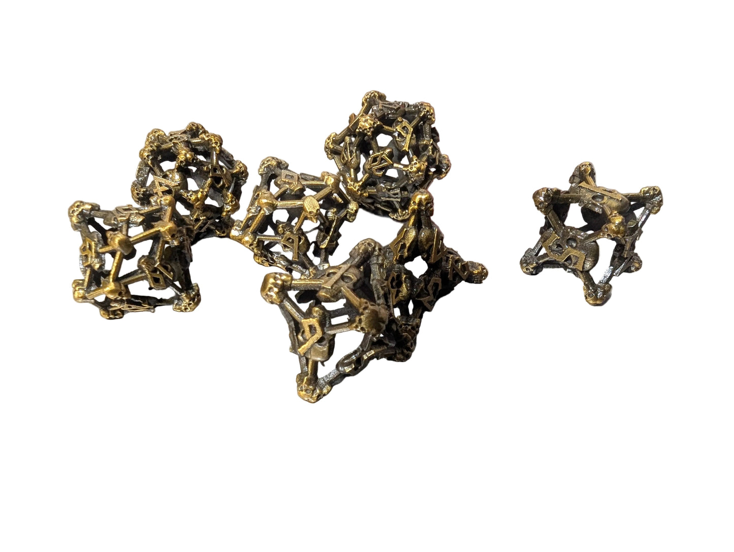 Gold Deadly Skull Dice Hollow Metal 7-Dice Set