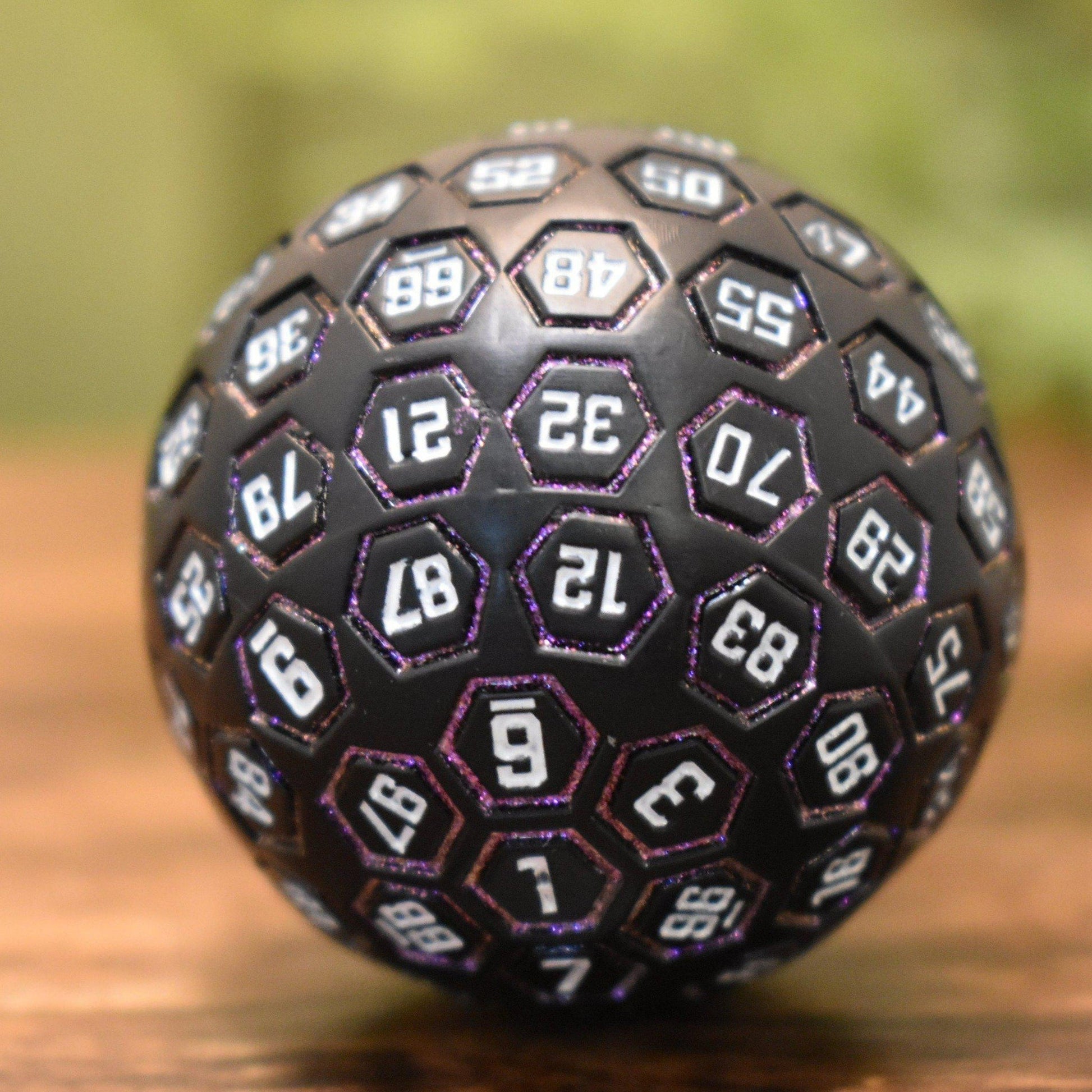 The Orb D100 -  Purple, White, and Black Metal Die