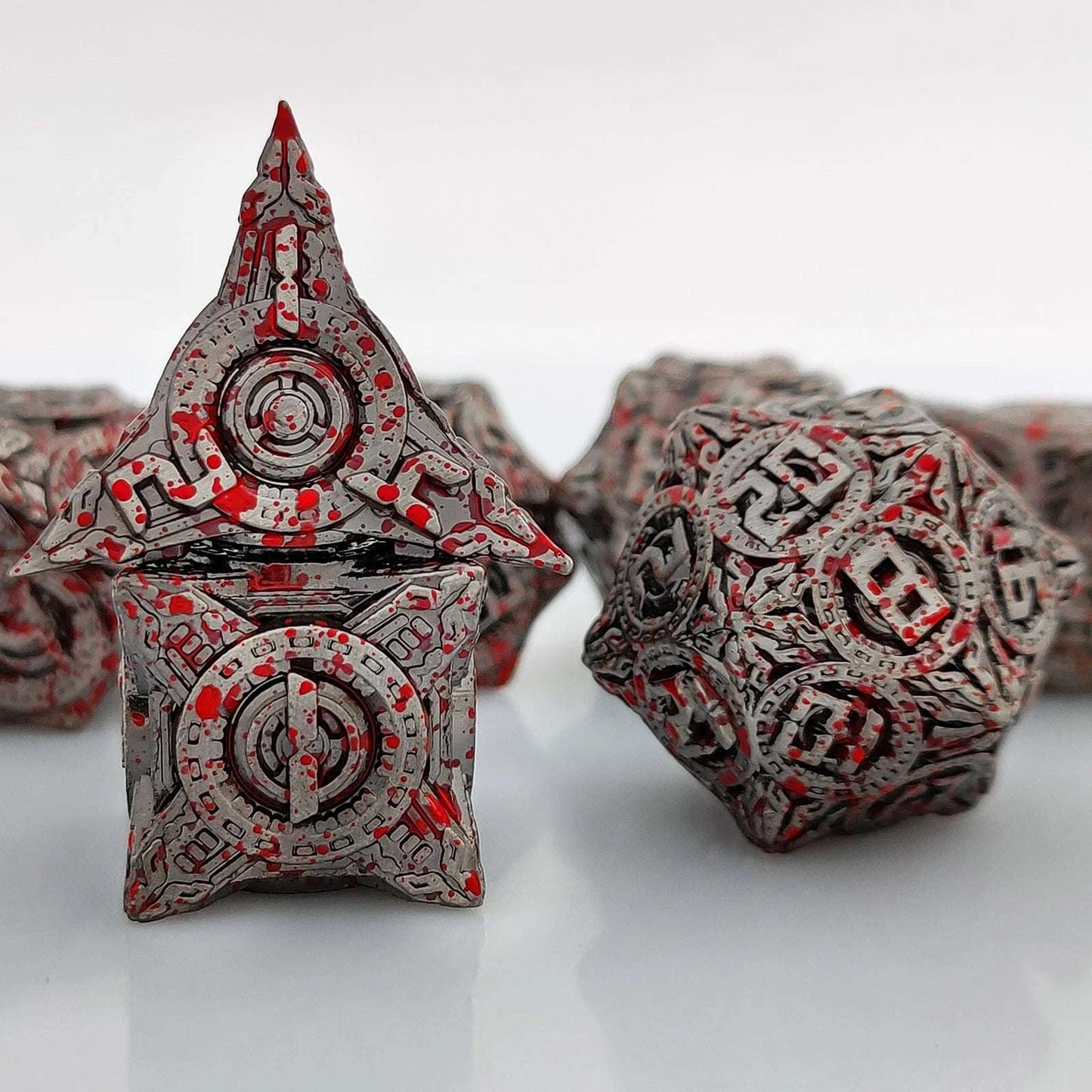 UFO mechanical style metal dice set with blood stains